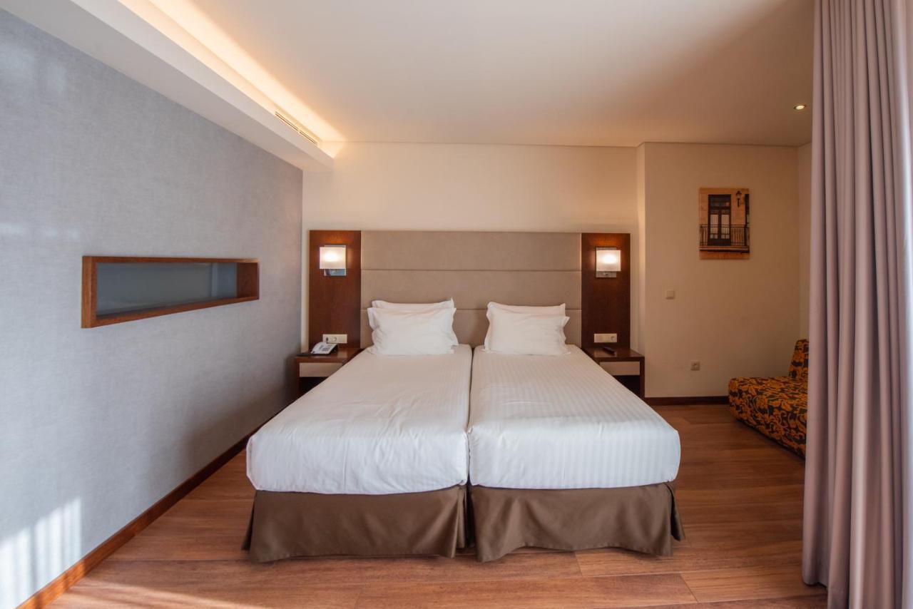 Quarto Twin com Cama Extra