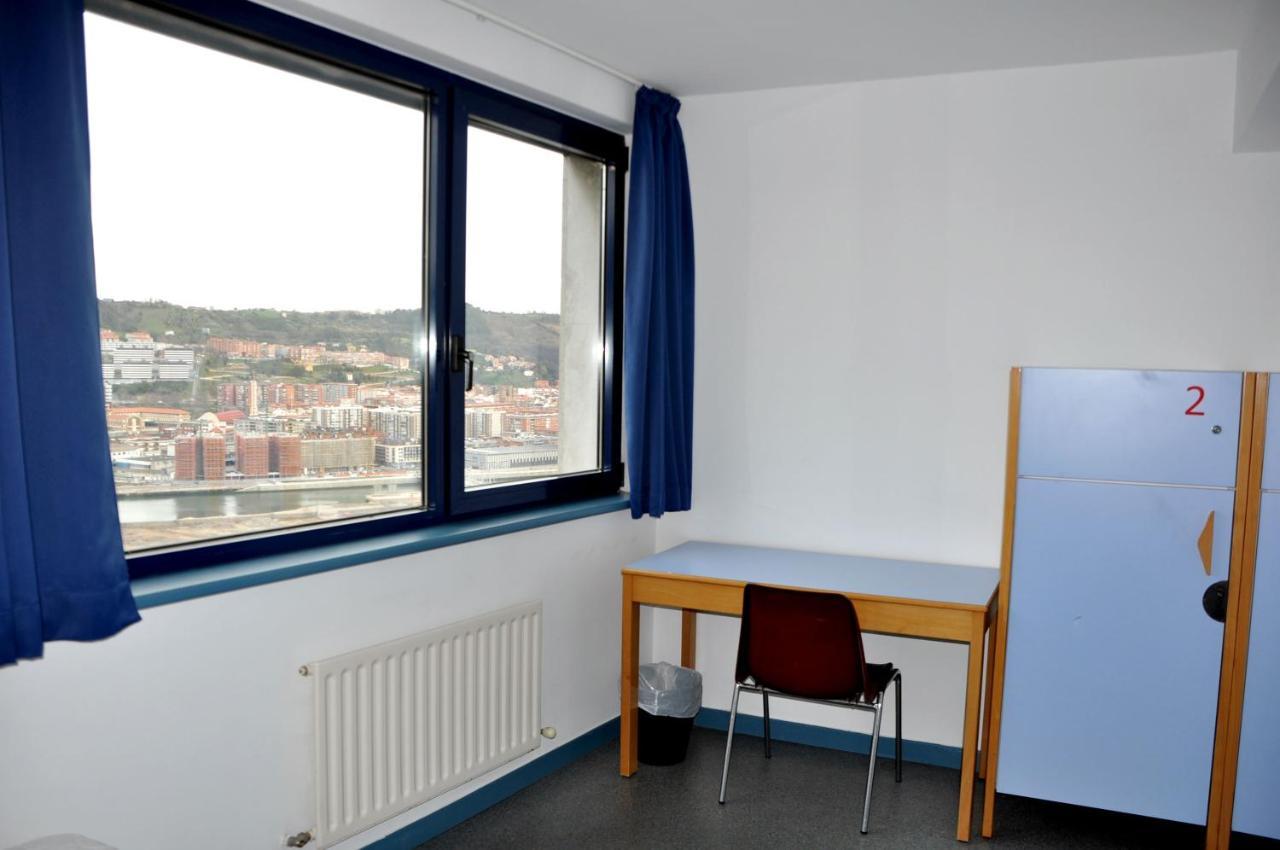 Quarto Quádruplo com Casa de Banho Partilhada