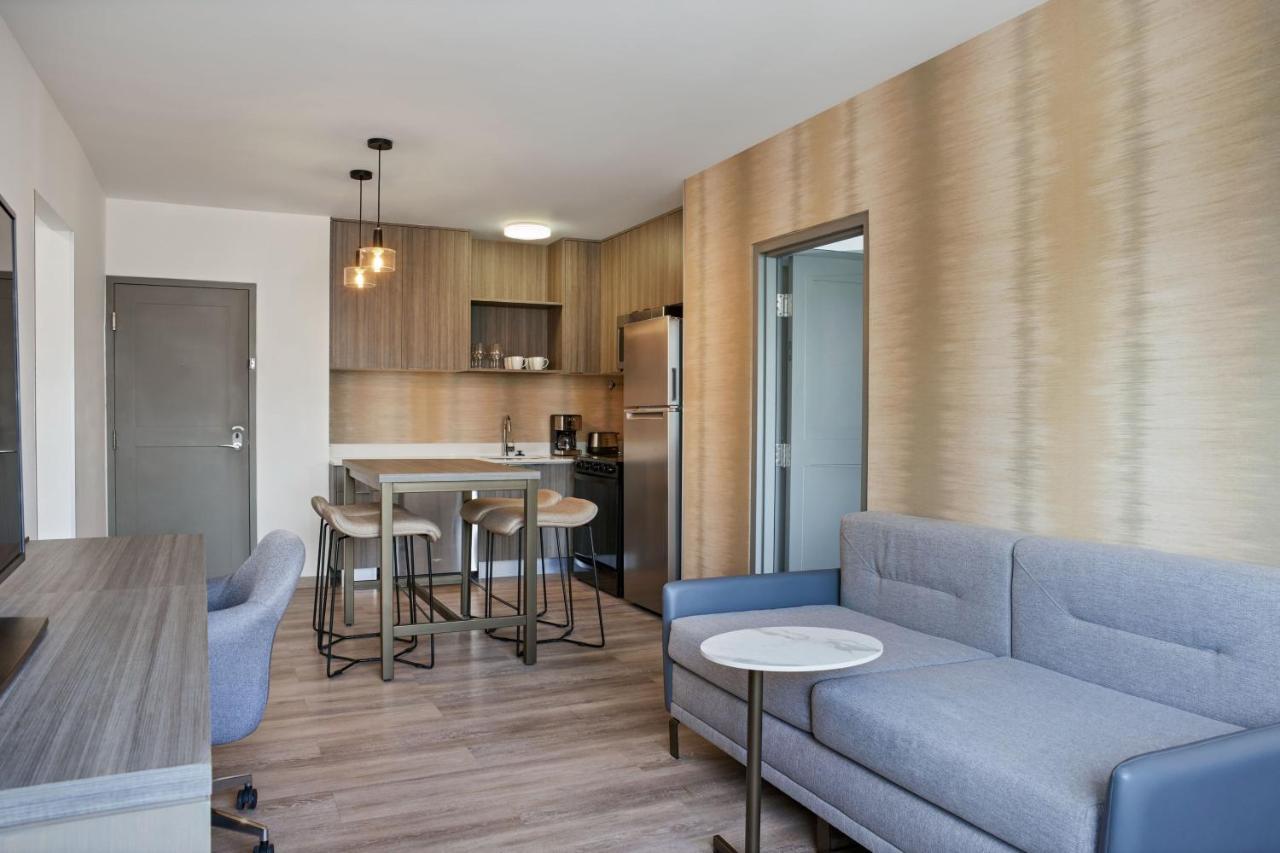 Two-Bedroom Suite with Balcony and Partial Golf View