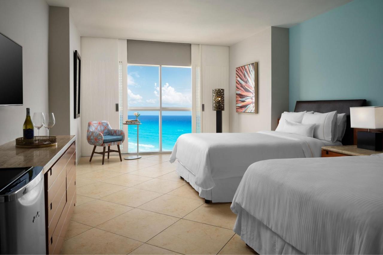 Double Room with Two Double Beds and Ocean View,1419286914:JPEG