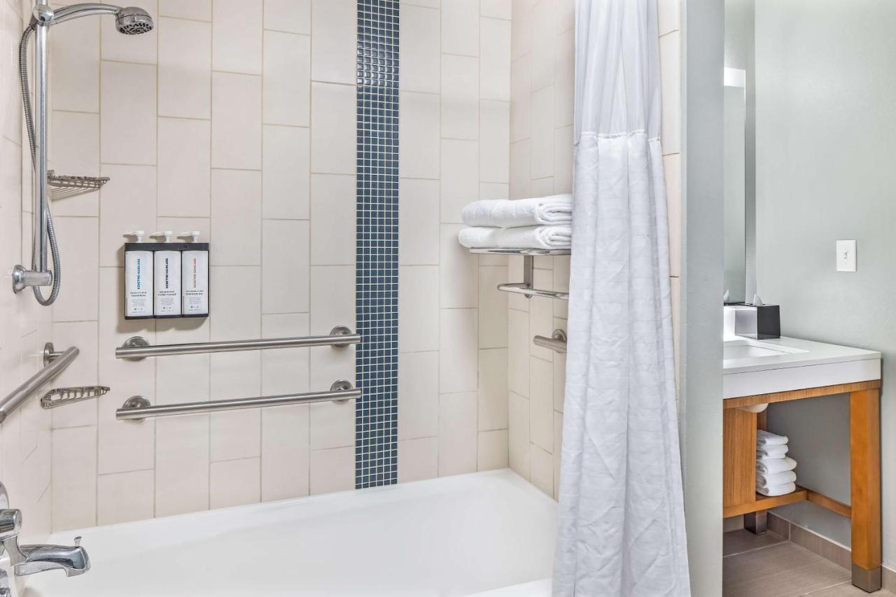 Queen Room with Two Queen Beds with Sofa Bed, City View and Tub - Disability Access