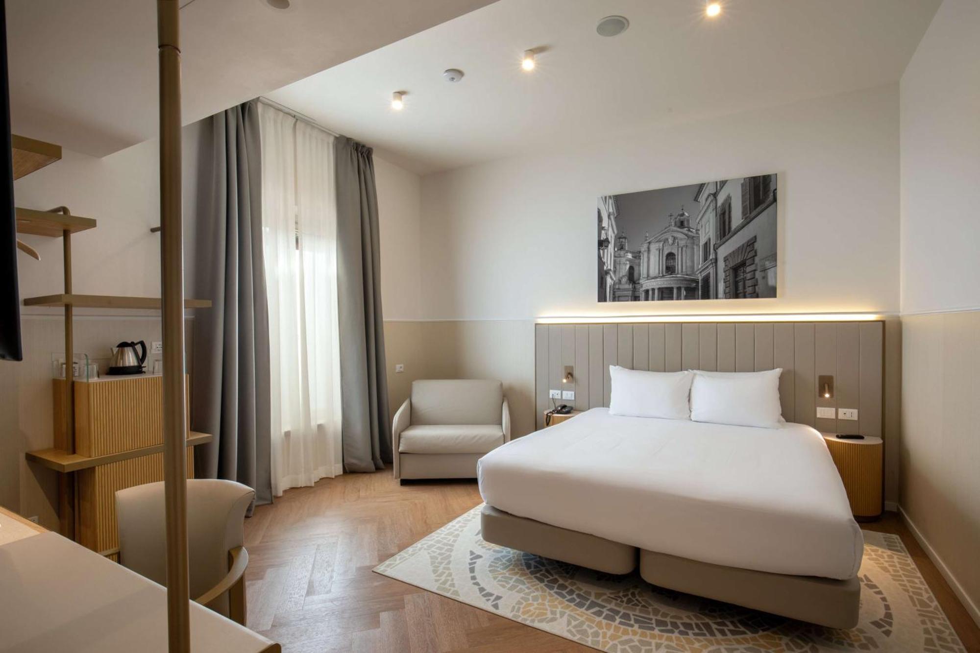 Camera King Superior con Poltrona-Letto
