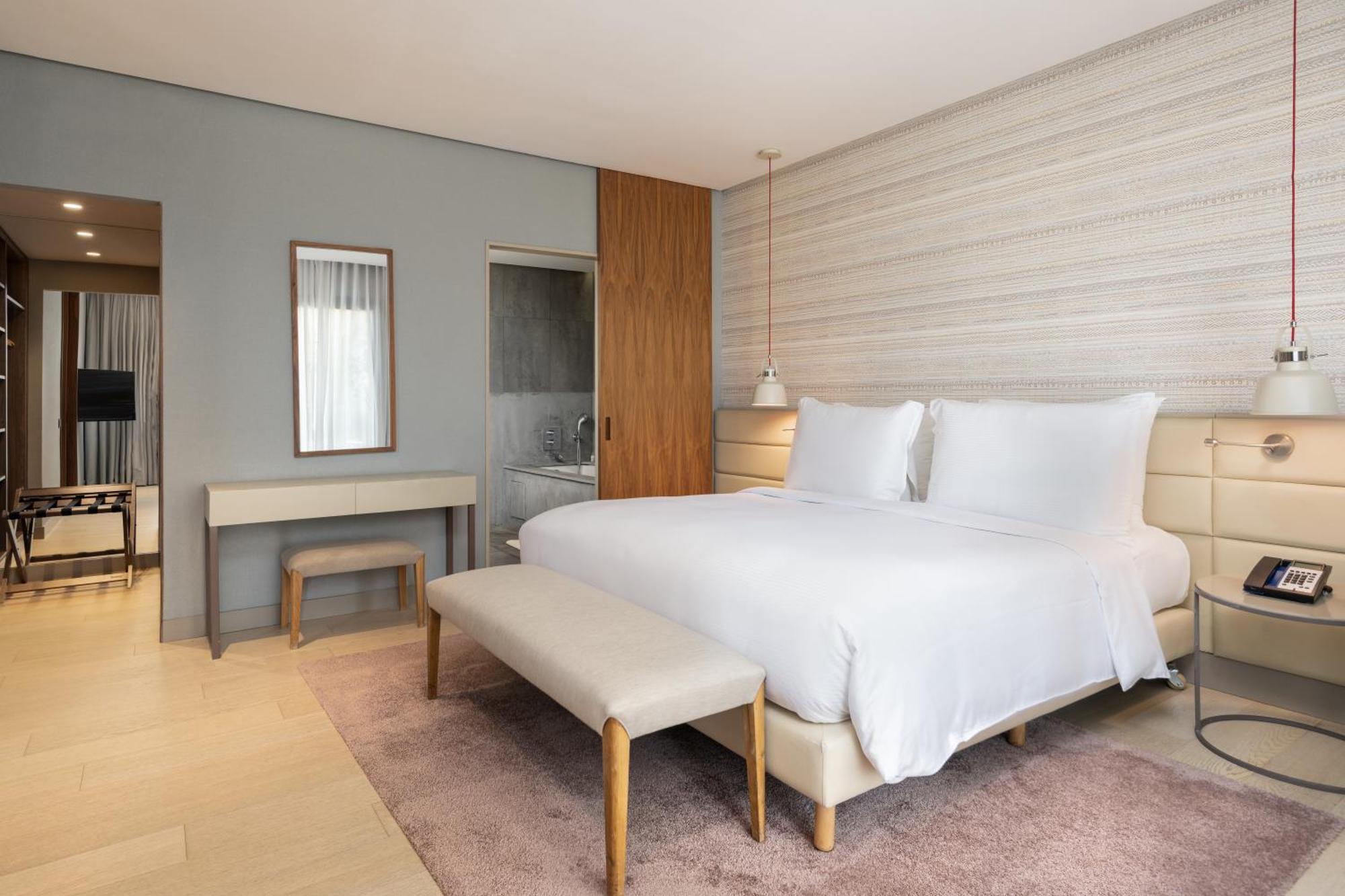 Junior Suite - Uitzicht op het Zwembad - Balkon