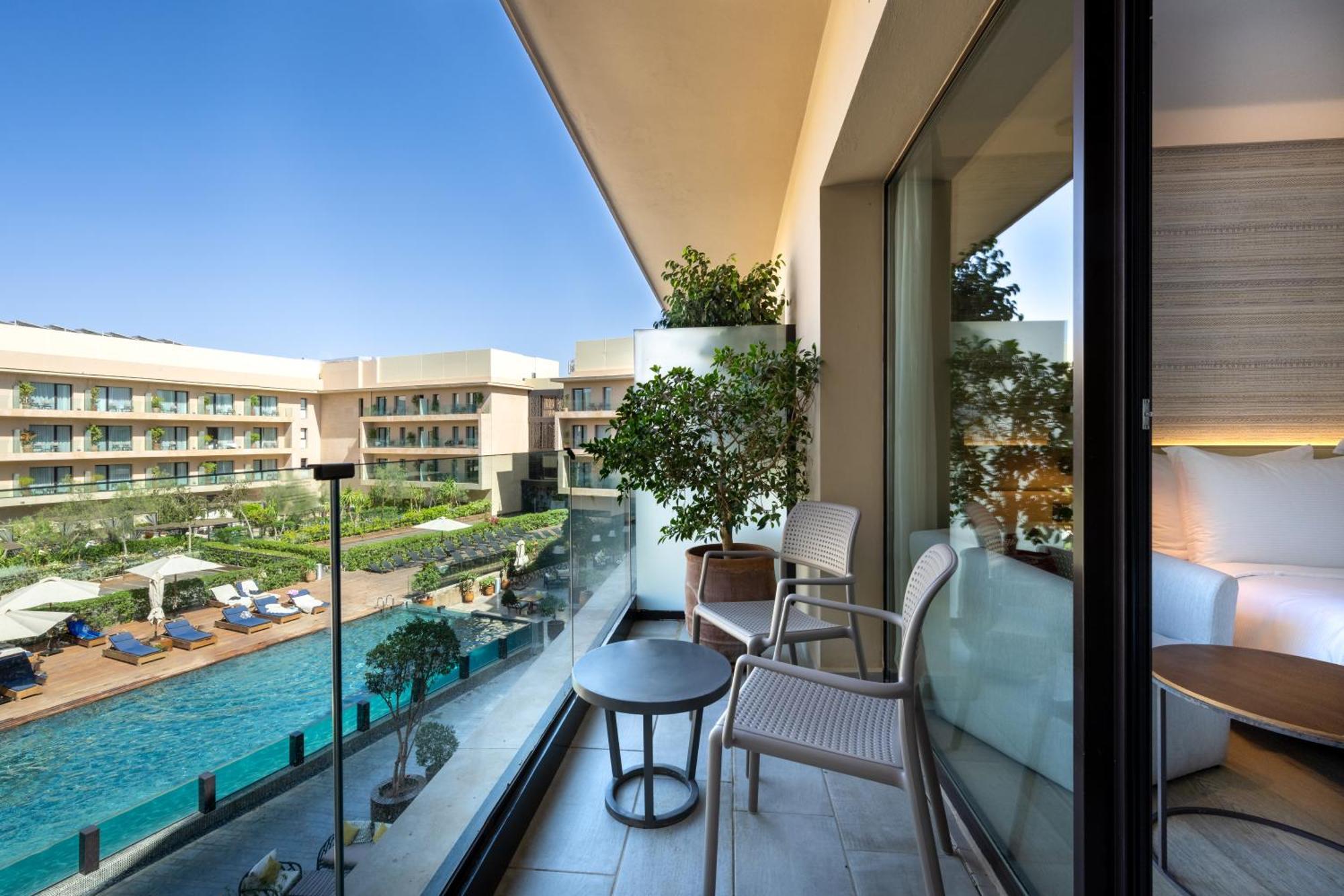 Premium Kamer - Uitzicht op Zwembad - Balkon