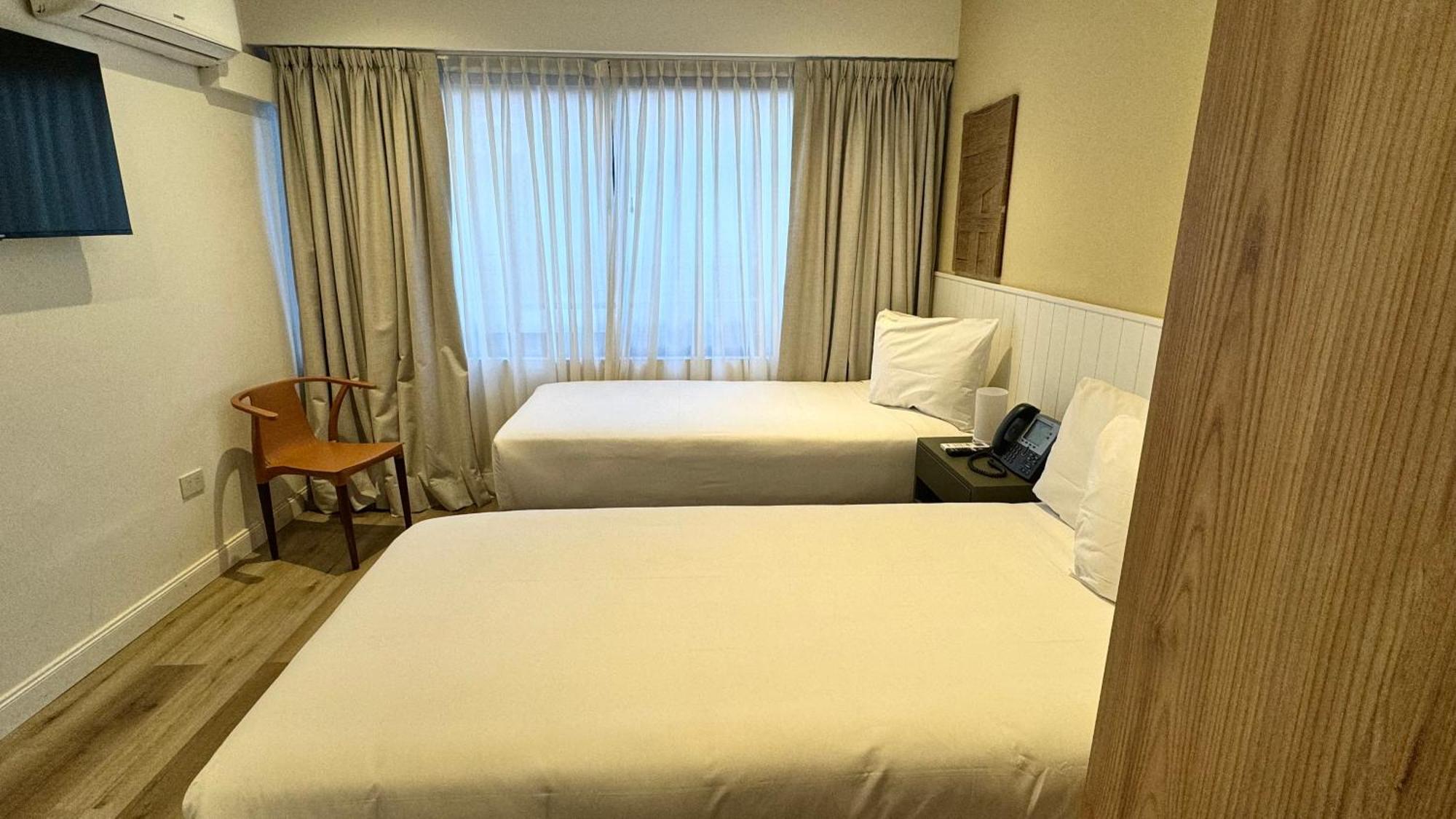 Quarto Duplo