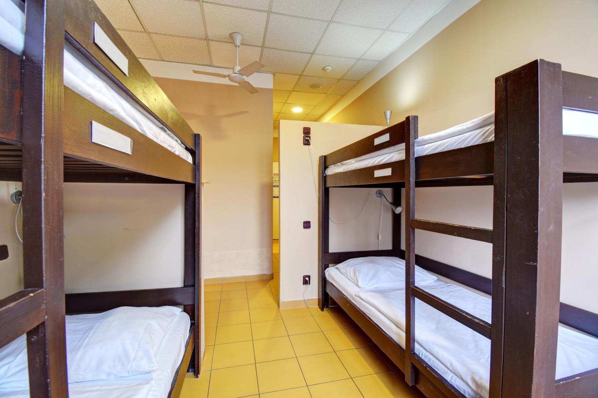 Cama em Dormitório com 4 Camas