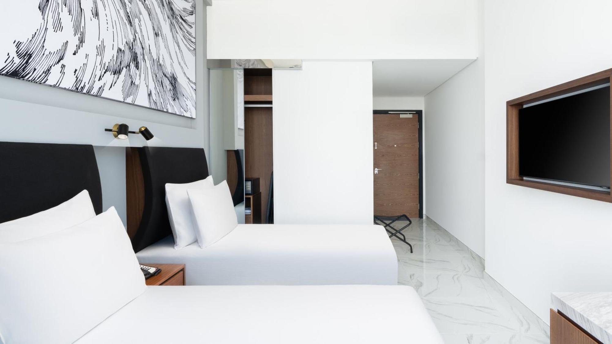 36 Hours Stay with Early check-in at 6 AM & Late check-out at 6 PM, 36% off F&B, upgrade to next room category (subject to availability) - Standard Twin Room