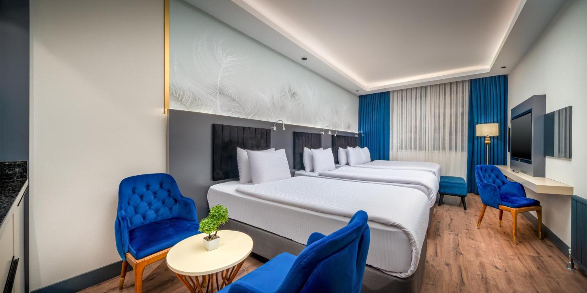 Superior Room with One Double and Two Single Beds - Non-Smoking