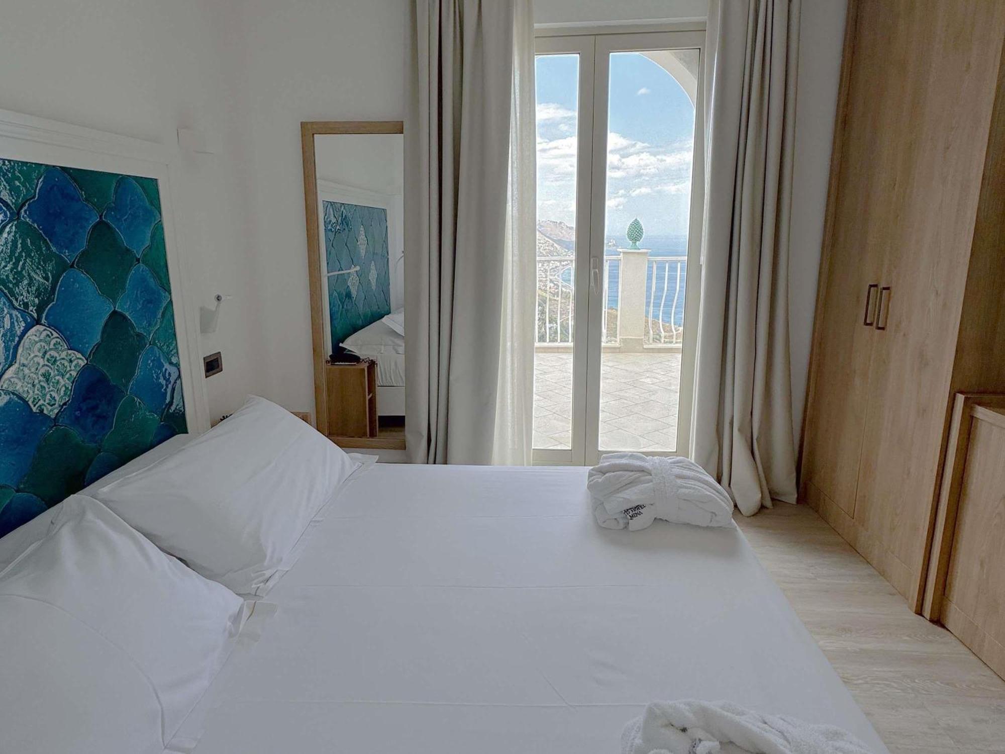 Deluxe Room with Queen Bed and Sofa Bed