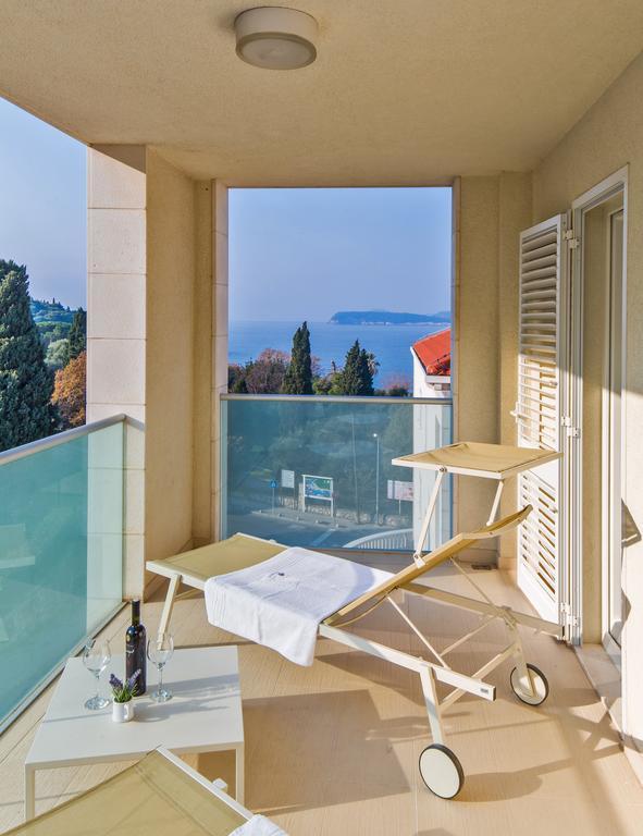 Deluxe Three-Bedroom Apartment Terrace Partial Sea View