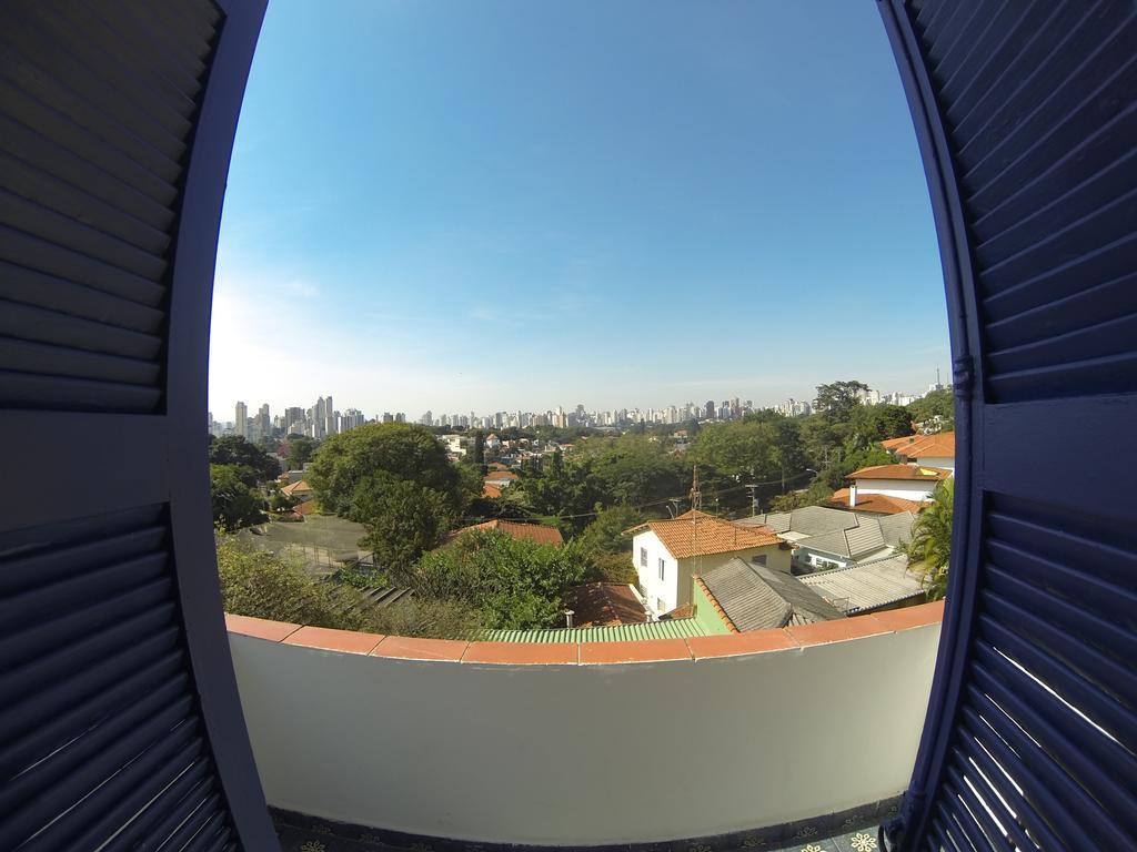 Camera Tripla con Terrazza e Bagno in Comune