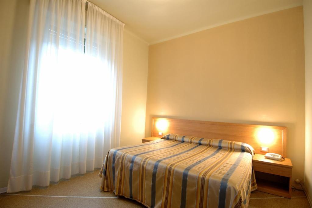 Tweepersoonskamer met 1 of 2 Bedden en Gedeelde Badkamer