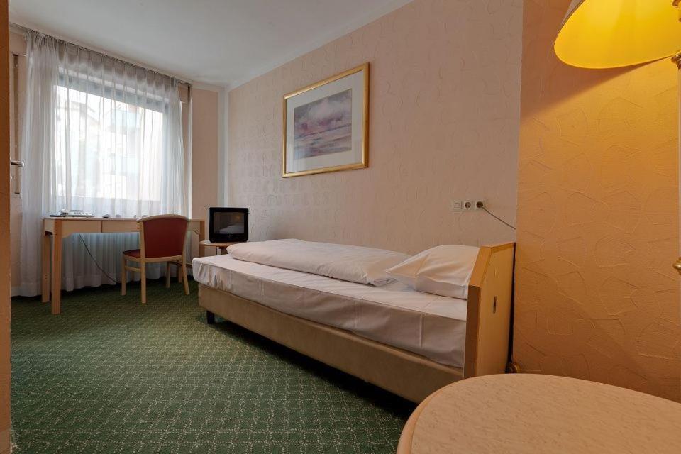 Eenpersoonskamer met Gedeelde Badkamer