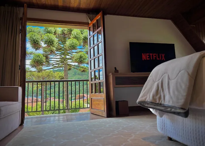 Hotel com piscina: Casa Três Rios - Campos do Jordão