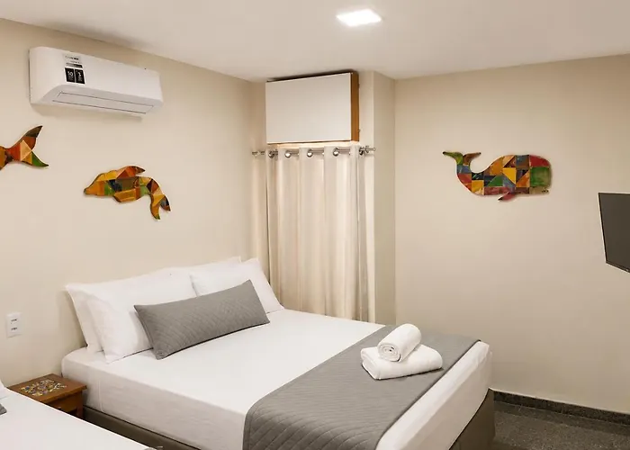 SEGUNDA CASA - Seu cantinho em , 1 minuto a pé da Praia do Morro! Suítes confortáveis e modernas - Para casal ou para grupos de até 4 pessoas